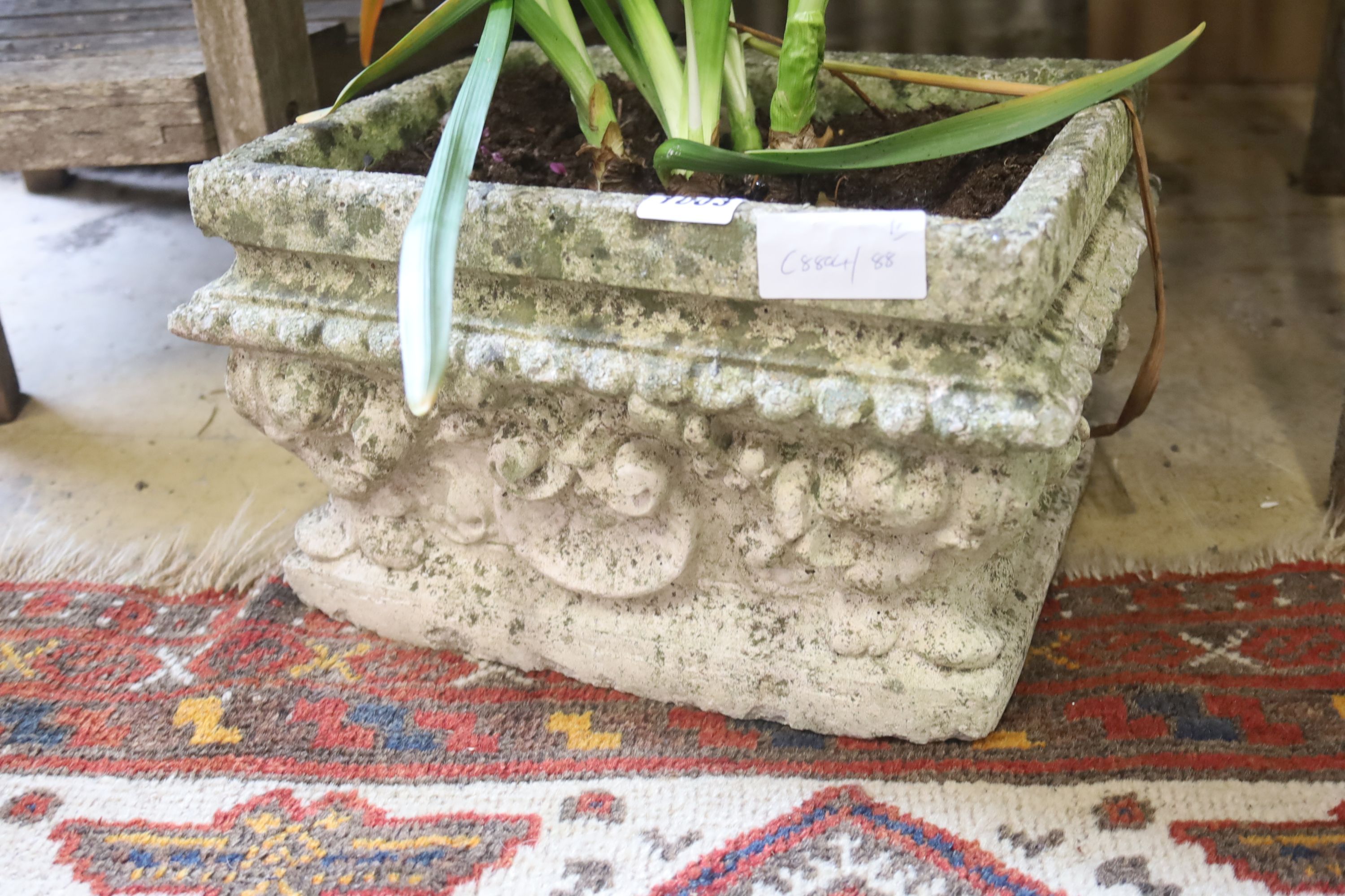 A pair of rectangular reconstituted stone garden planters, width 33cm, depth 27cm, height 20cm
